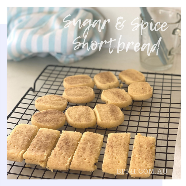 Spiced shortbread on baking tray sprinkled with Backpalate Flavour House spiced sugar.